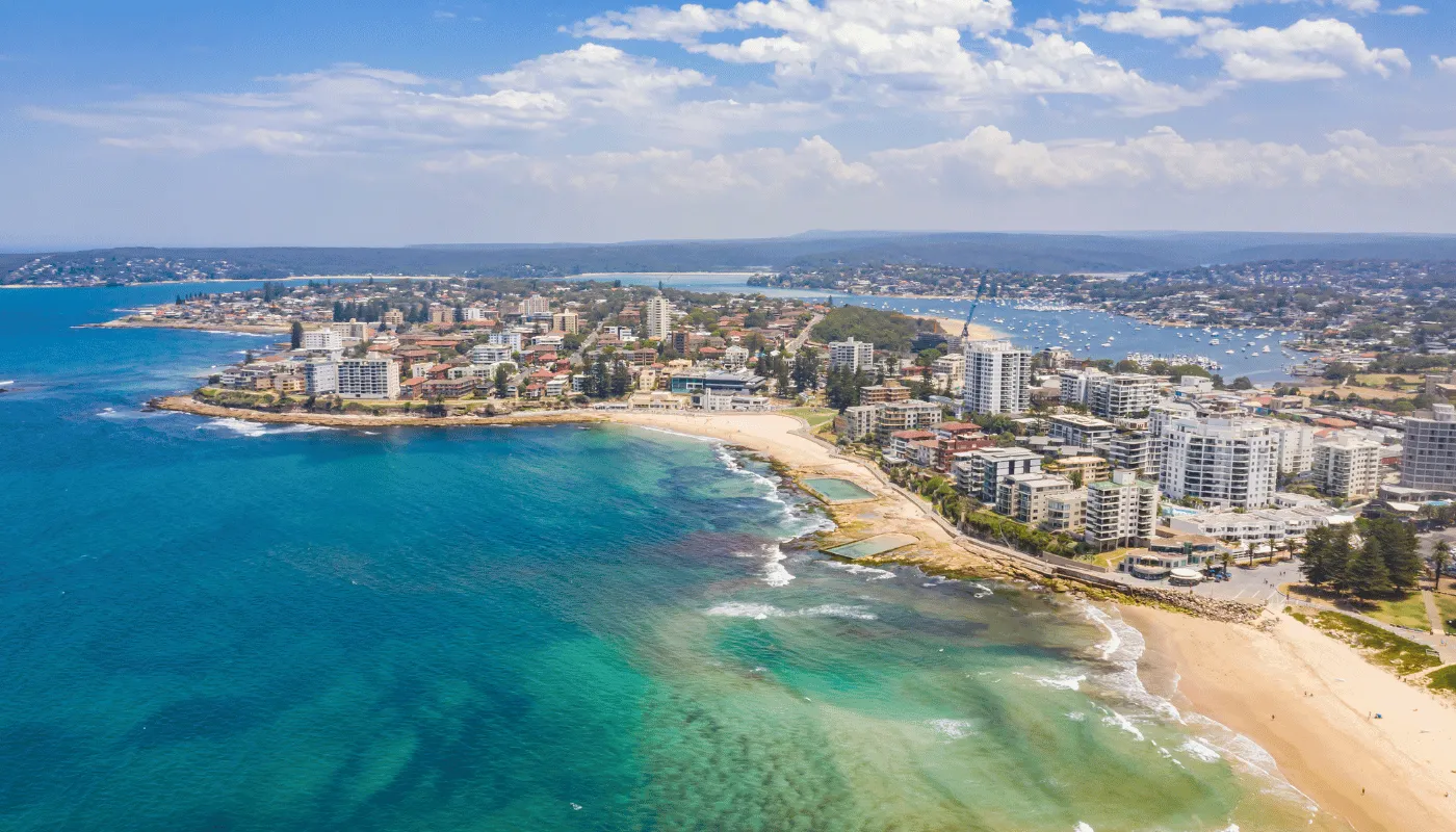 Cronulla from the air: the beach, the surf and rows of homes running back from the water