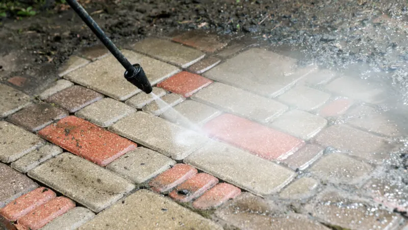 Pressure cleaning a brick driveway
